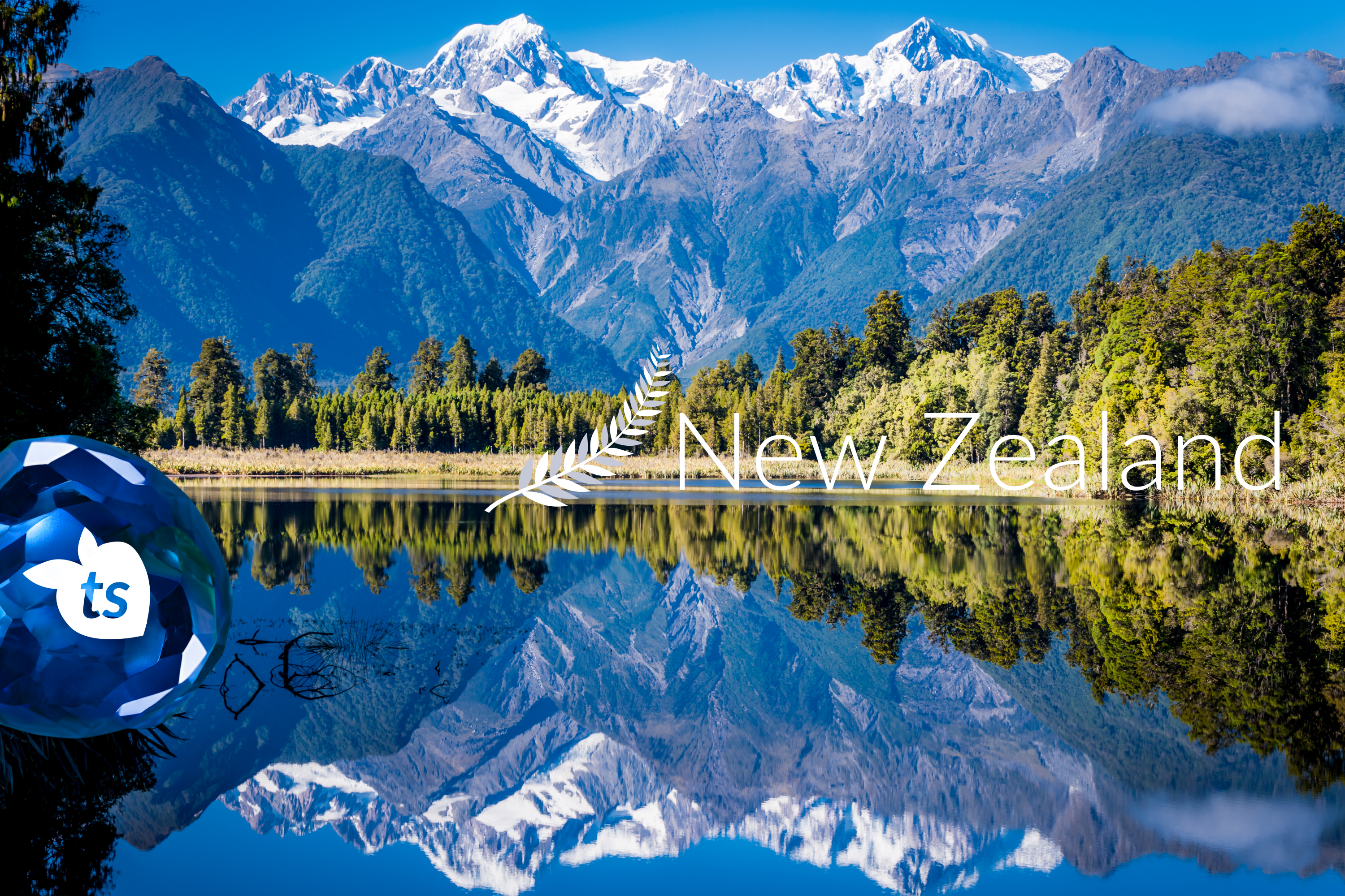 Mountainous landscape with a lake and snow-capped peaks in New Zealand, featuring the 'ts' logo.