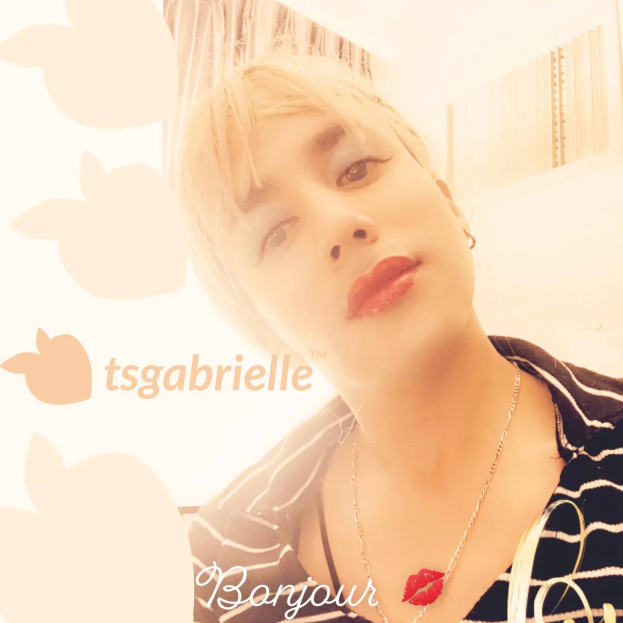 Gabrielle with a floral background and 'tsgabrielle' branding